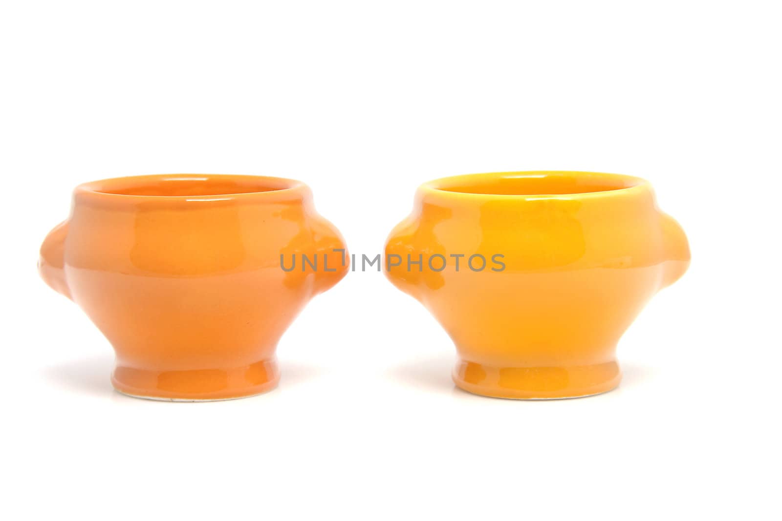 Two orange egg container bowls isolated on white background
