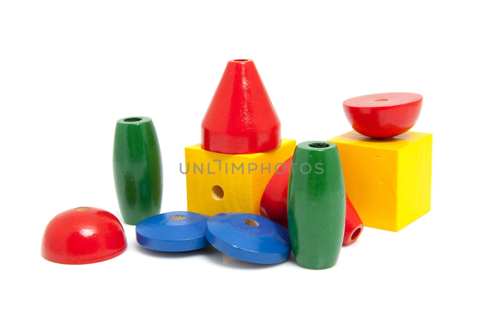 colorful wooden children's beads for necklase over white background