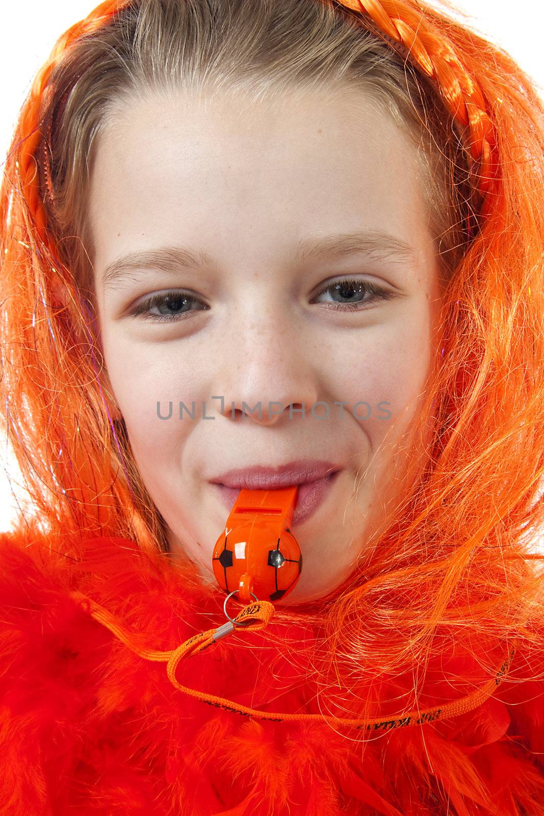 Girl is posing in orange outfit for soccer game or queensday over white background