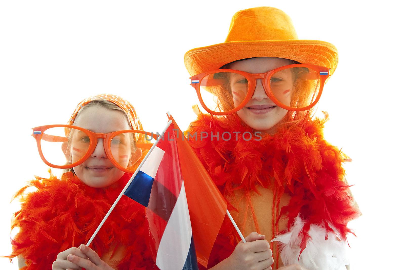 Two girls posing in orange outfit for soccer game or Dutch Queensday over white background