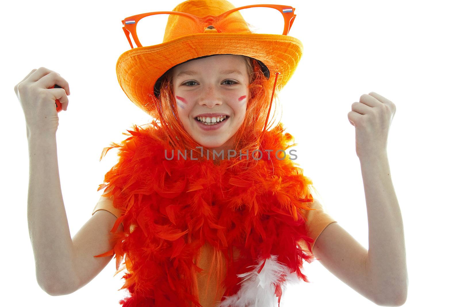 Happy soccer supporter: young blonde girl in orange outfit  is cheering