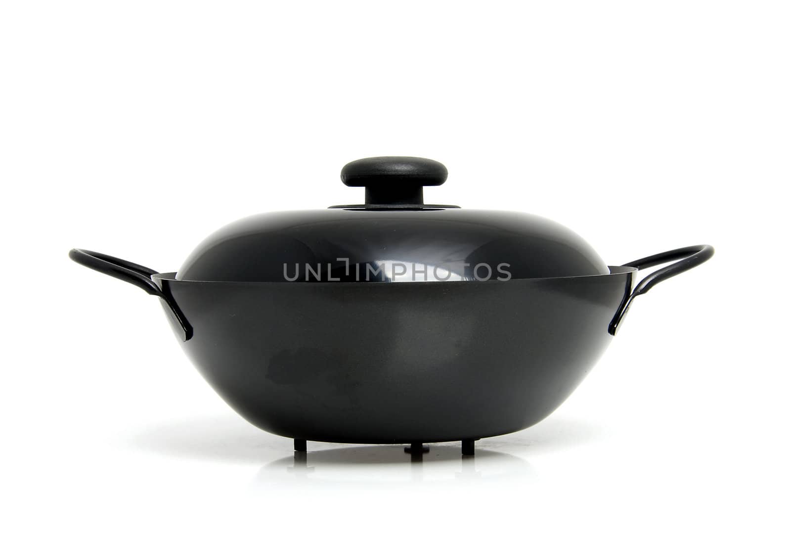 Black wok pan isolated on white background