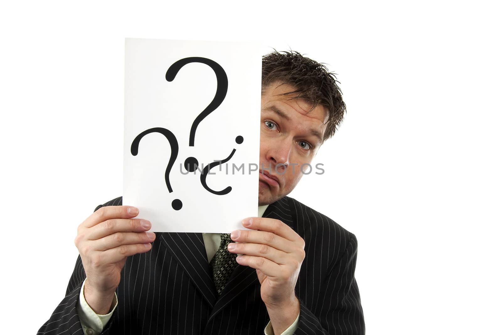 Businessman is holding question marks, isolated on white background