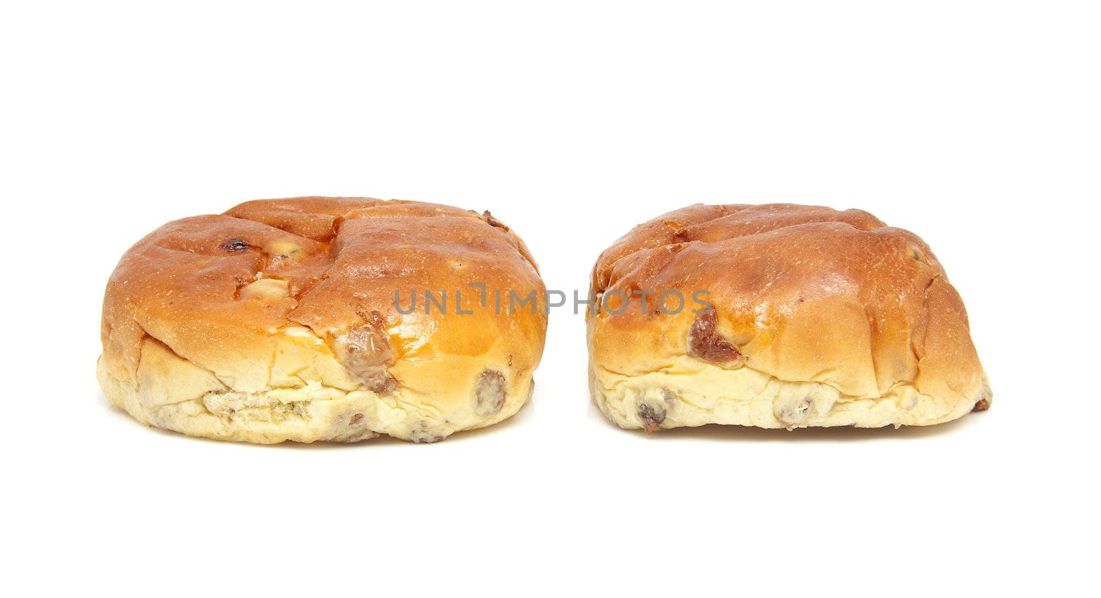two raisin bread, also known as krentenbollen, isolated on white background