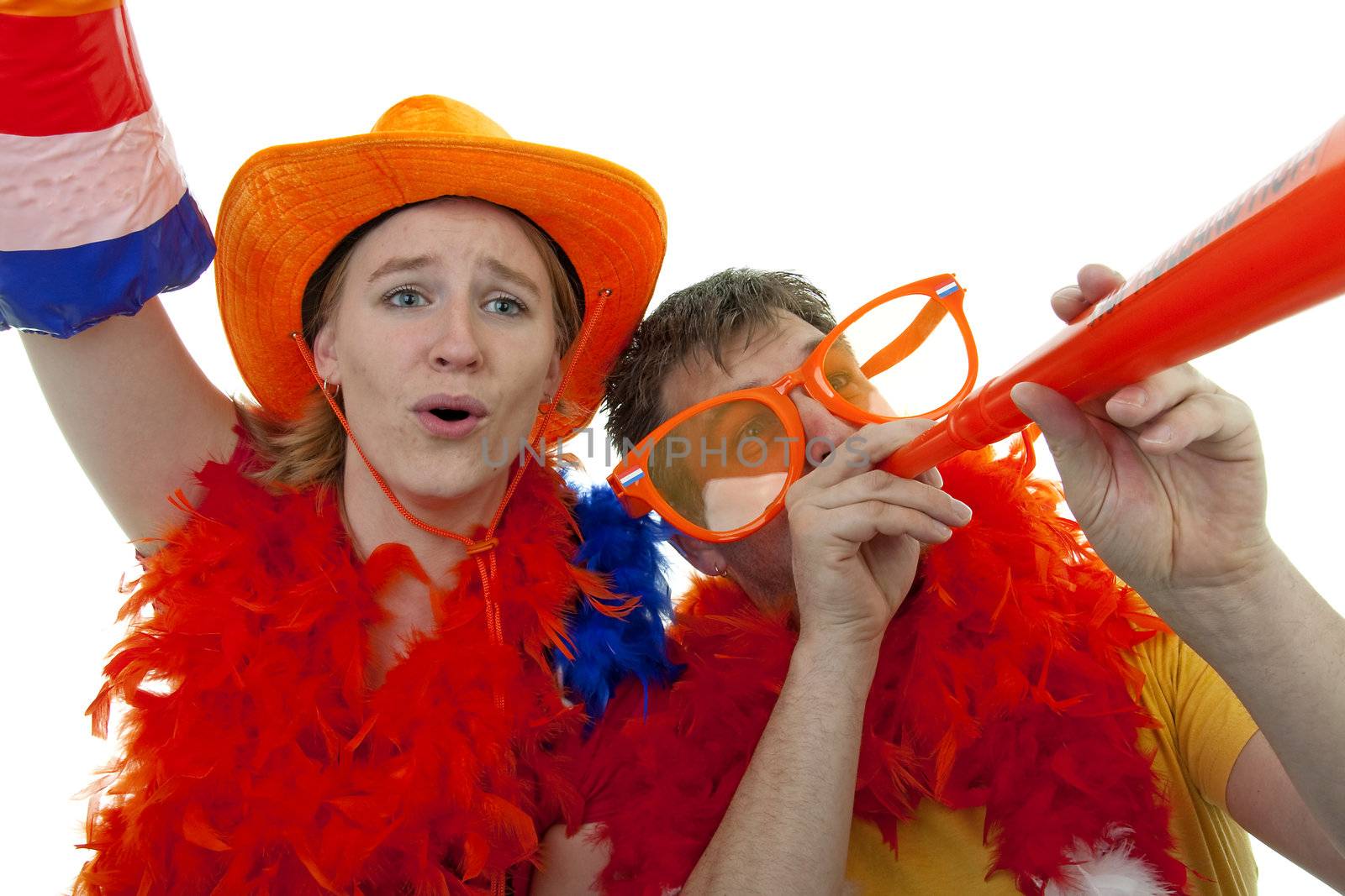 Two Dutch soccer fans in orange outfit cheering for the WK games, over white background