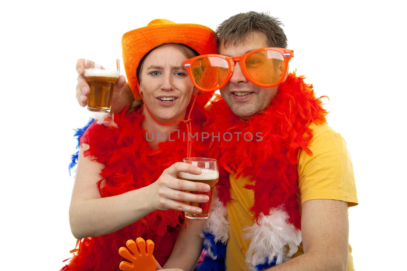 Two Dutch soccer fans in orange outfit cheering for the WK games, over white background
