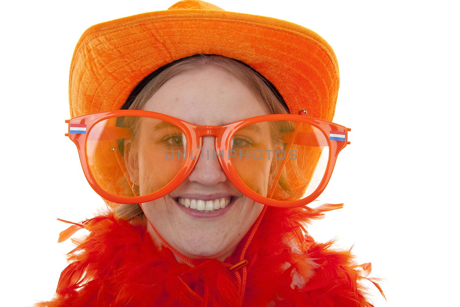 portrait of a soccer supporter with big orange glasses over white background