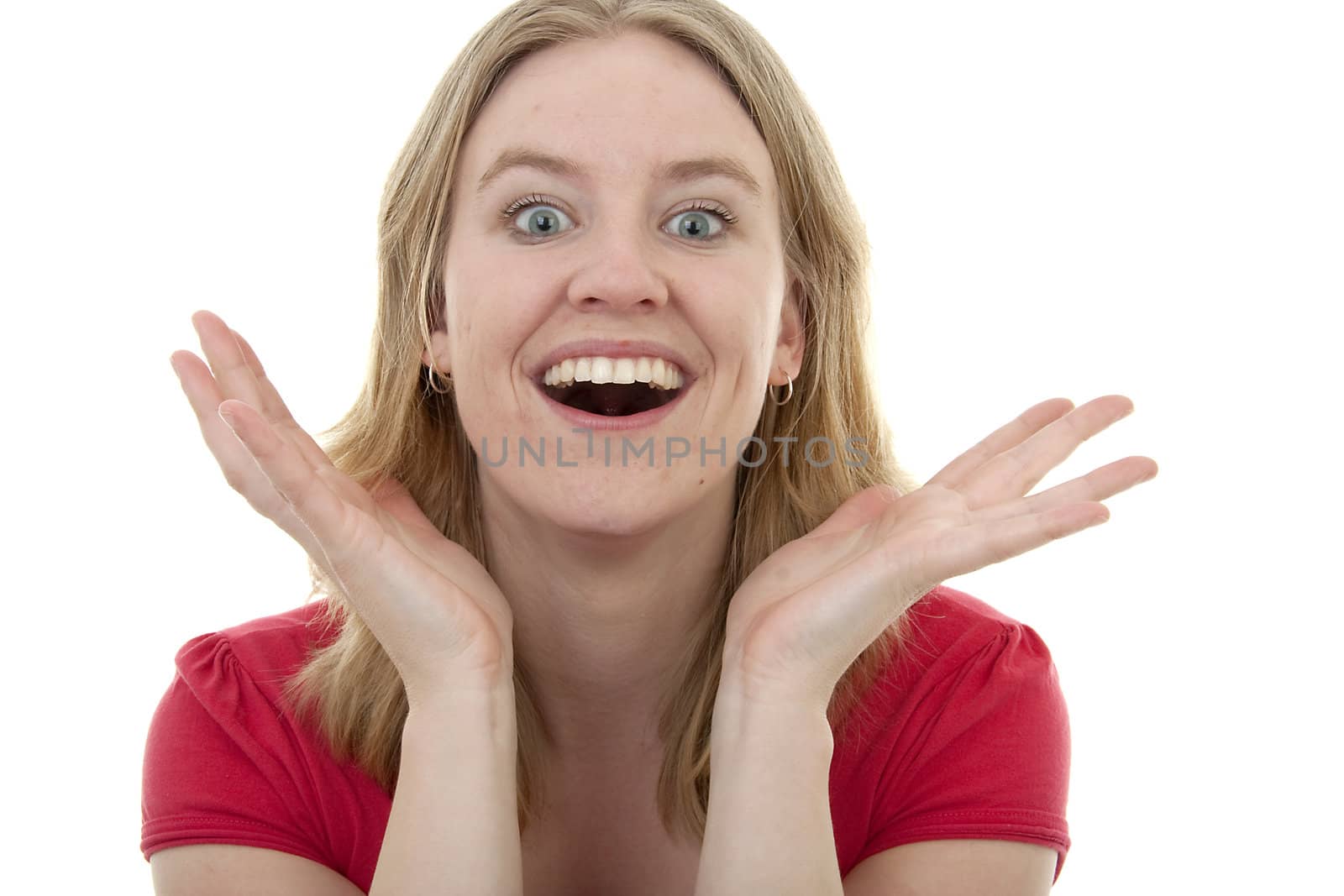 Young woman is looking surprised isolated on white background