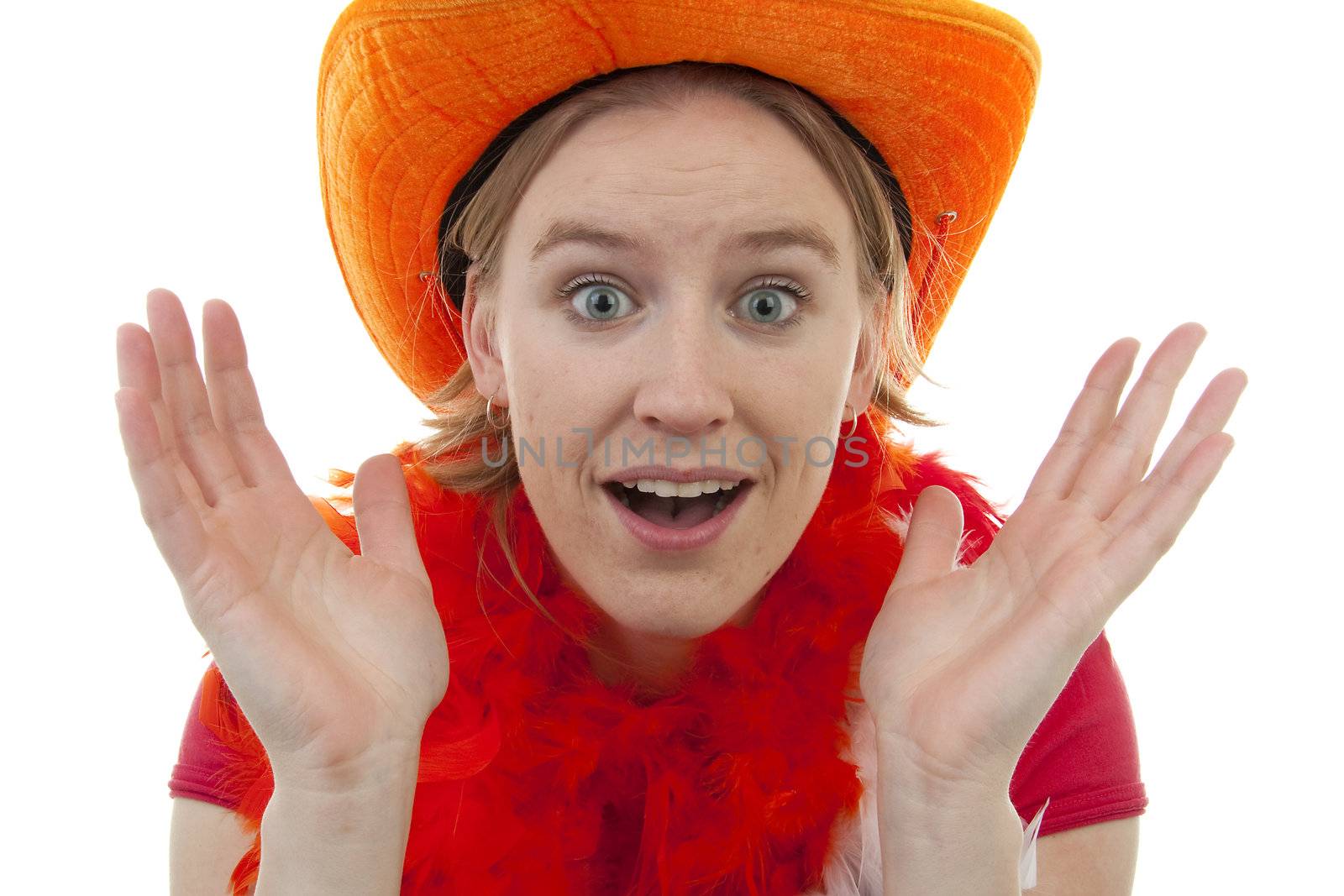 portrait of Dutch soccer fan in orange outfit who looks surprised over white background