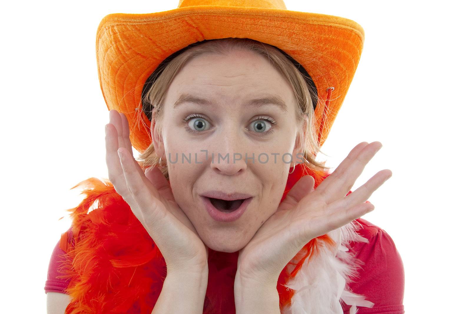 portrait of Dutch soccer fan in orange outfit who looks surprised over white background