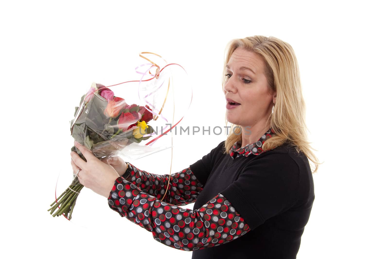 Woman gets flowers for mothers day or birthday over white background
