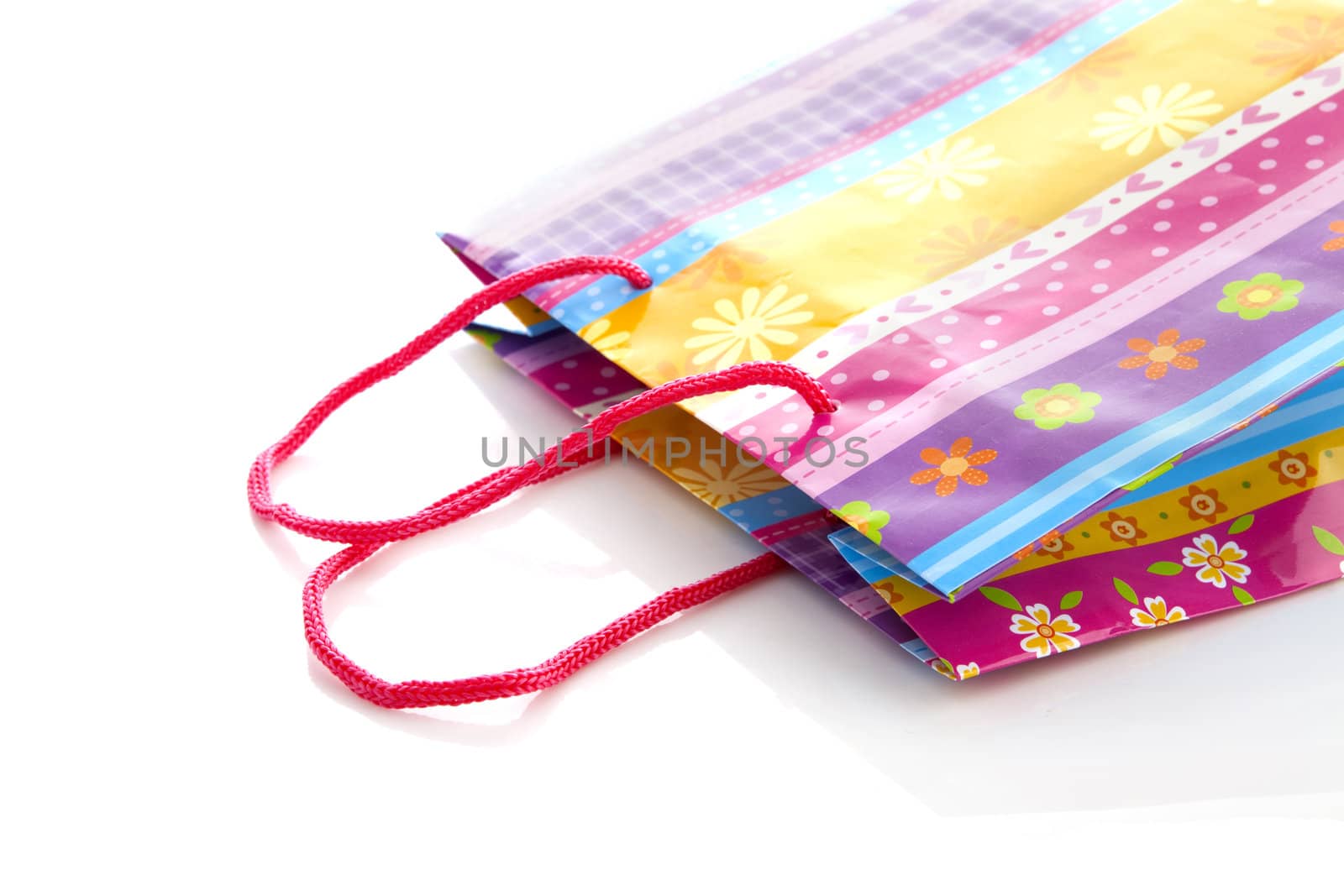Colorful shopping bag isolated on white background