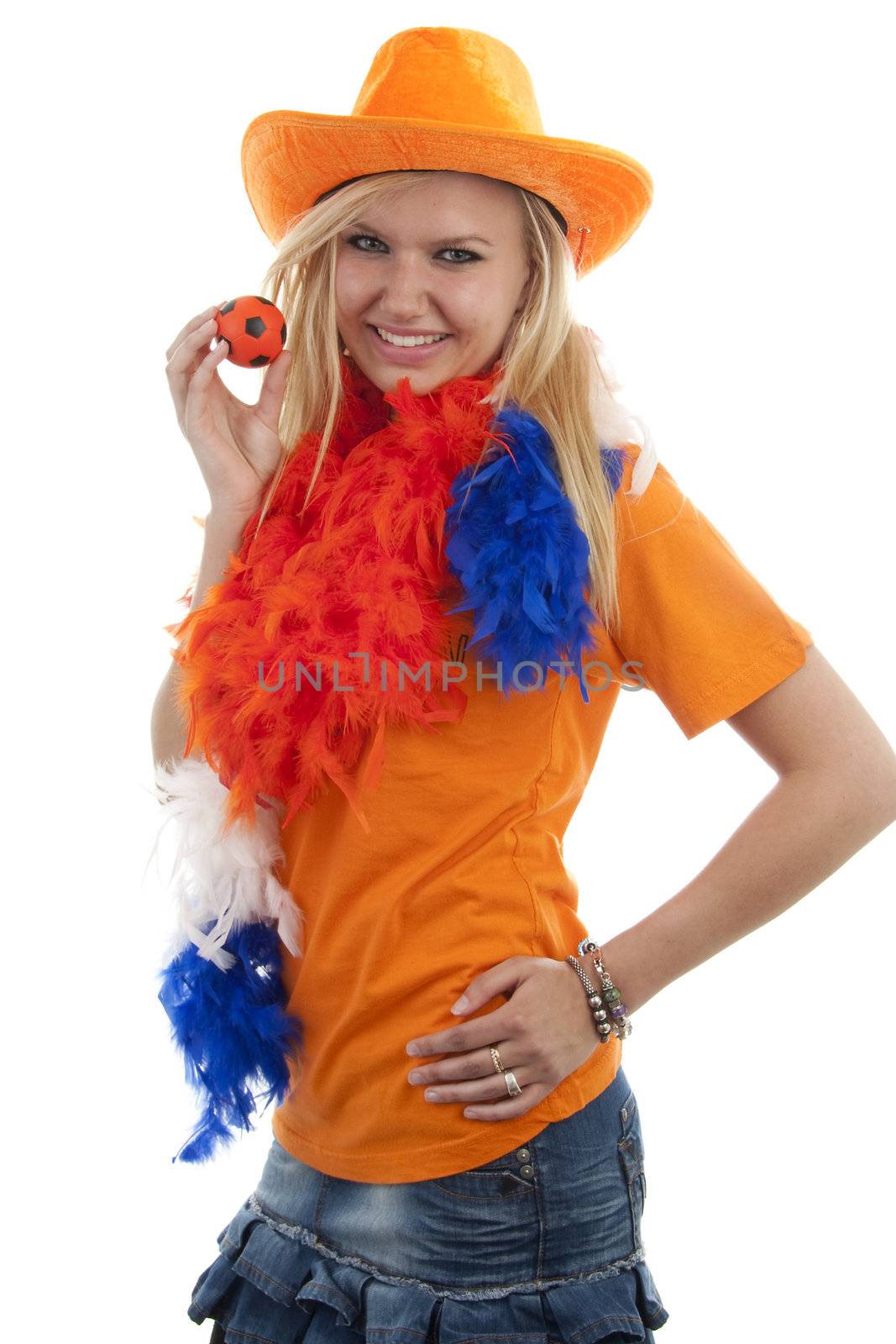 portrait of Dutch soccer fan in orange outfit over white background
