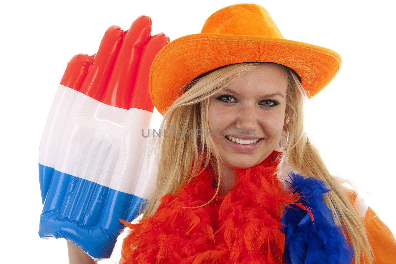 portrait of Dutch soccer fan in orange outfit with big glasses, hat and big hand over white background