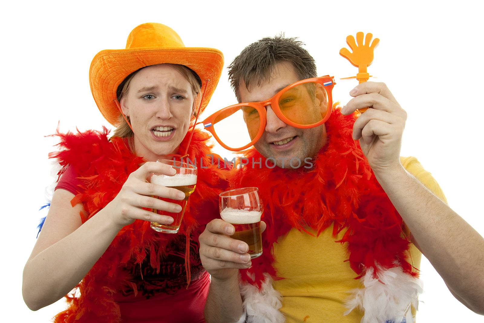Two Dutch soccer fans in orange outfit cheering for the WK games, over white background