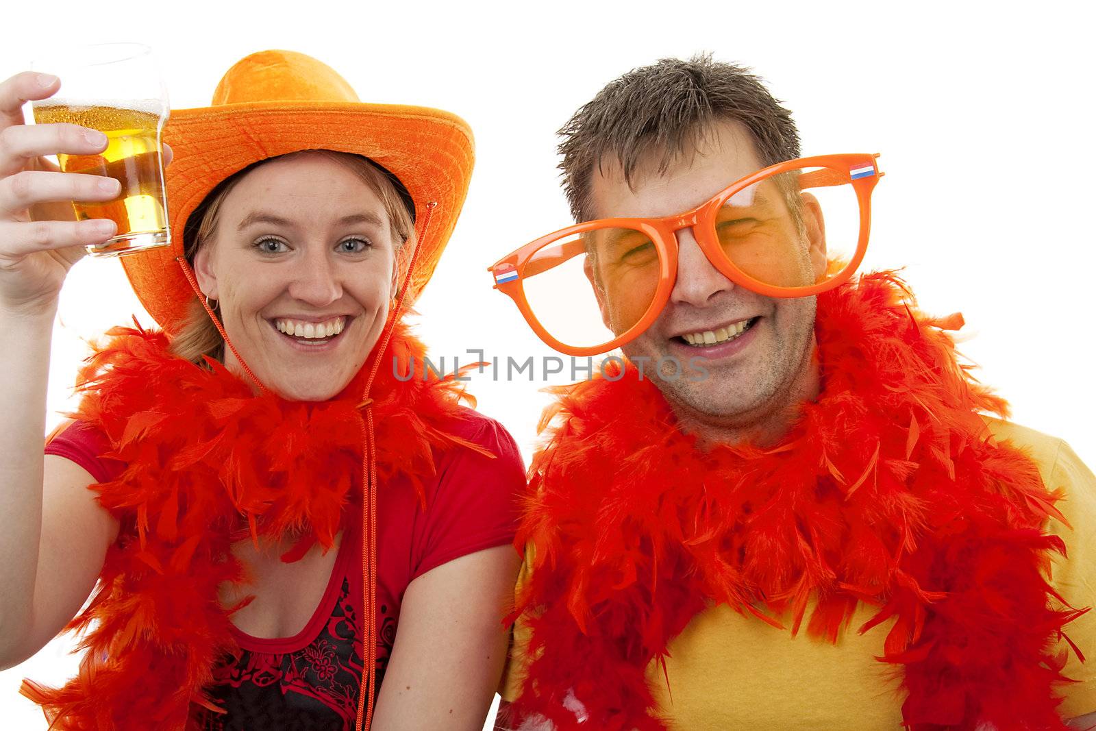 Two Dutch soccer fans in orange outfit cheering for the WK games, over white background