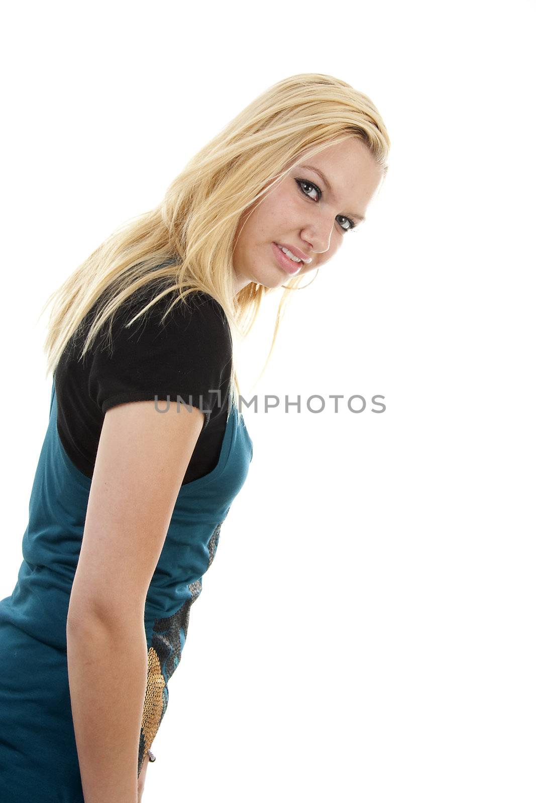 Young blonde woman is posing over white background