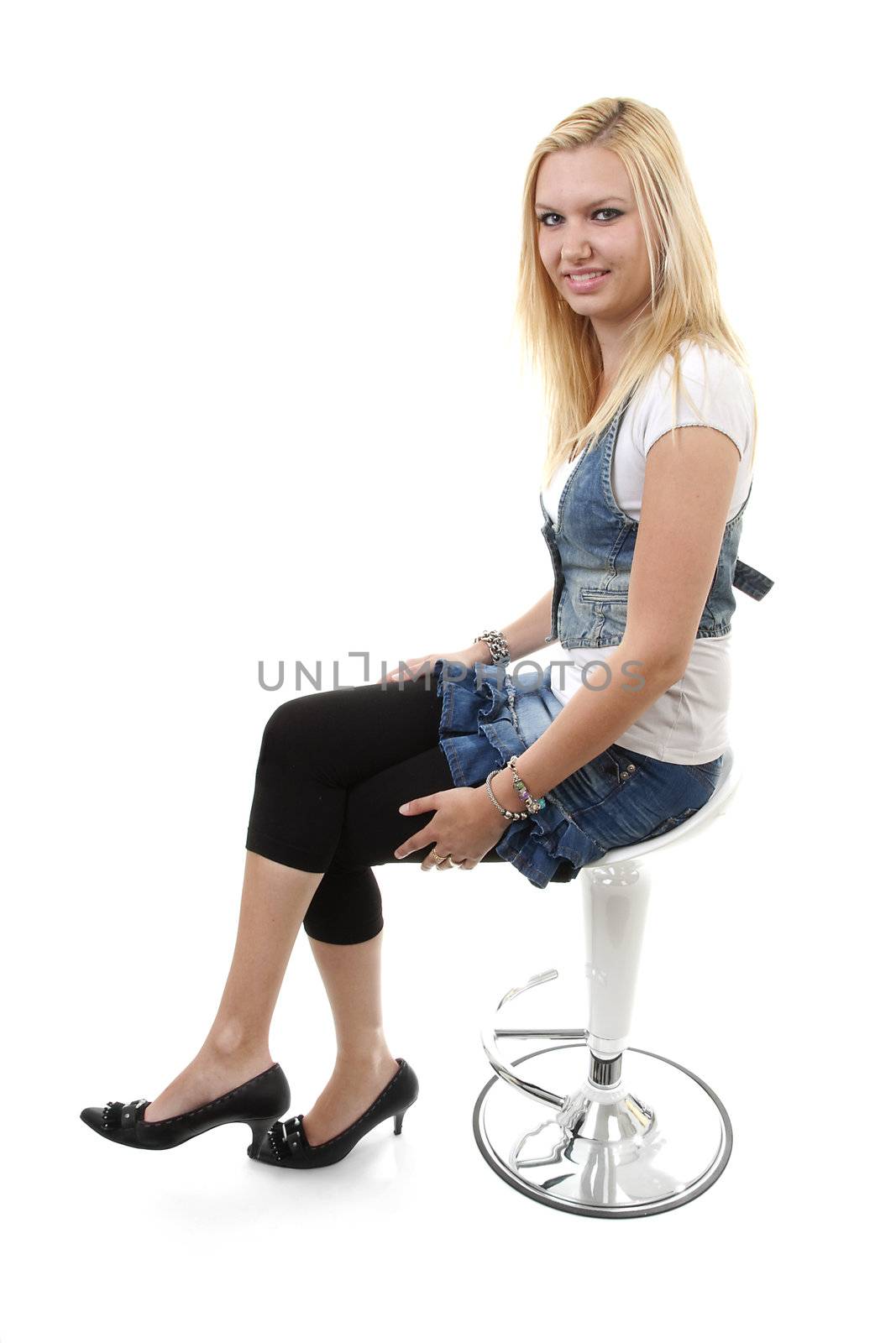 beautiful young woman posing on crutch  over white background