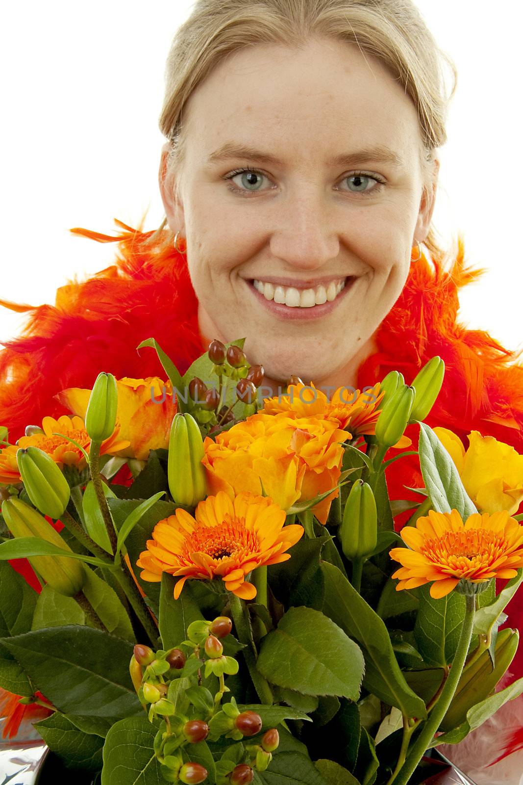 Woman with beautiful orange flowers in closeup over white background