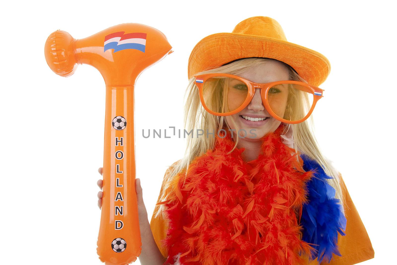 soccer supporter in orange outfit with blown up hammer over white background