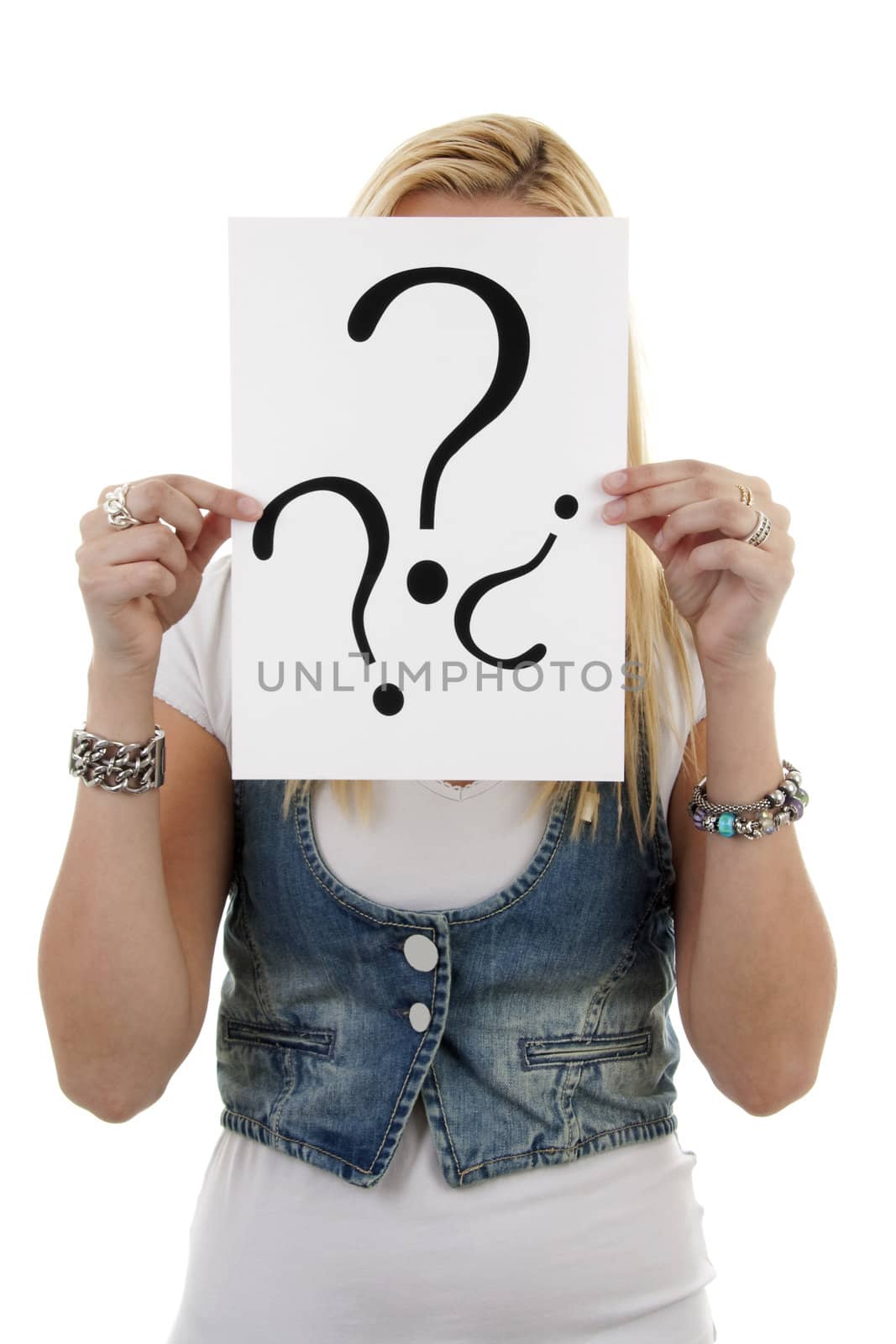 Woman is holding question mark over white background