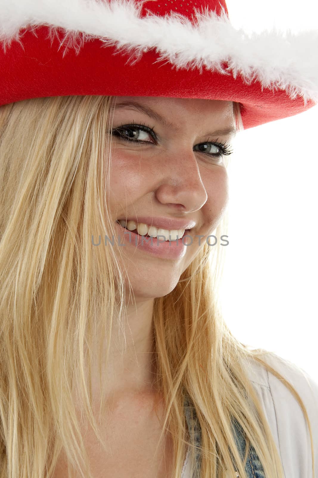 portrait of a woman with christmas hat in closeup over white background