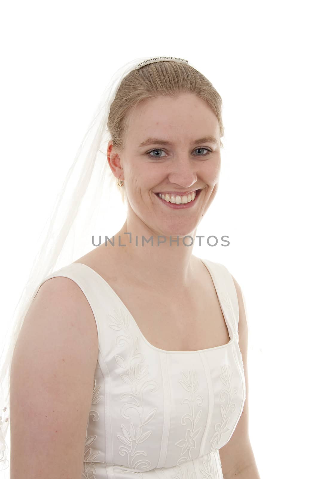 Young beautiful bride is posing over white background