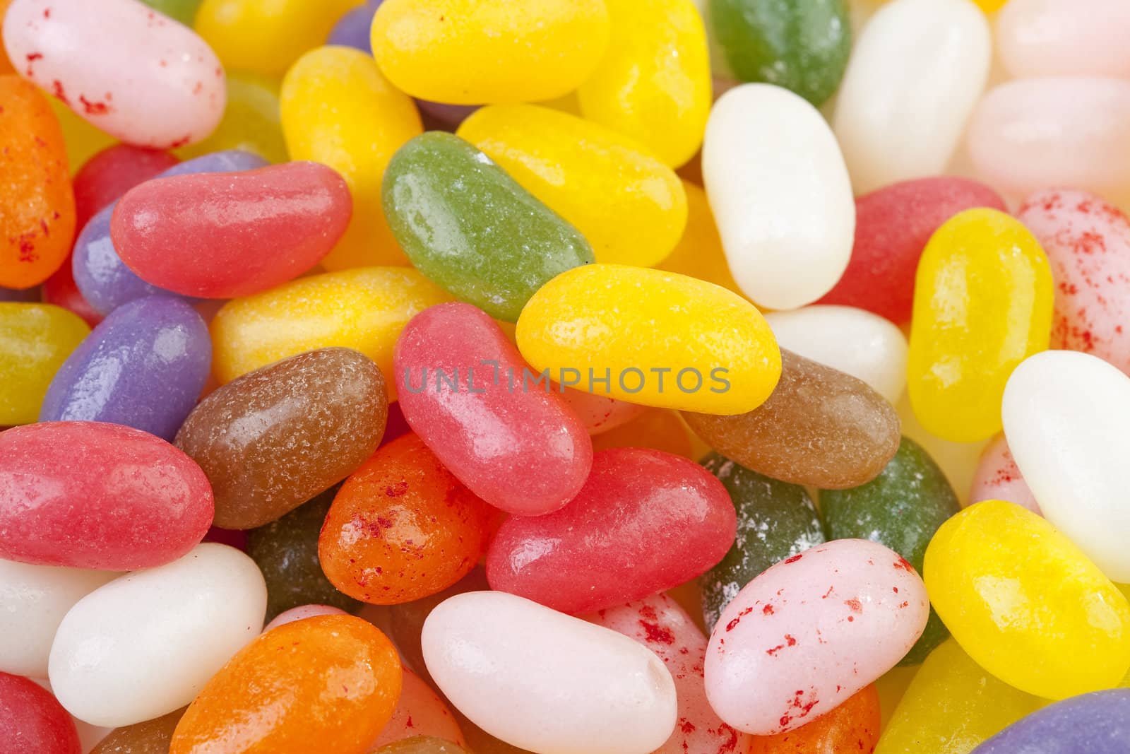 Colorful jelly beans candy in closeup can be used as background