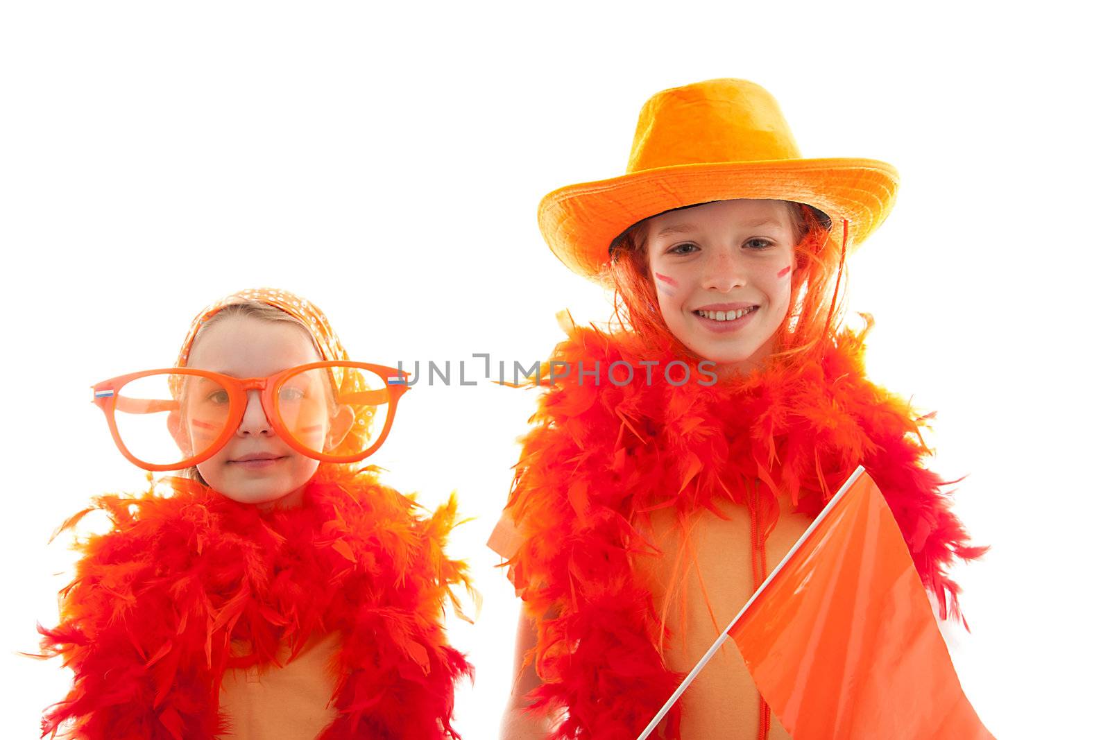 Two girls posing in orange outfit for soccer game or Dutch Queensday over white background
