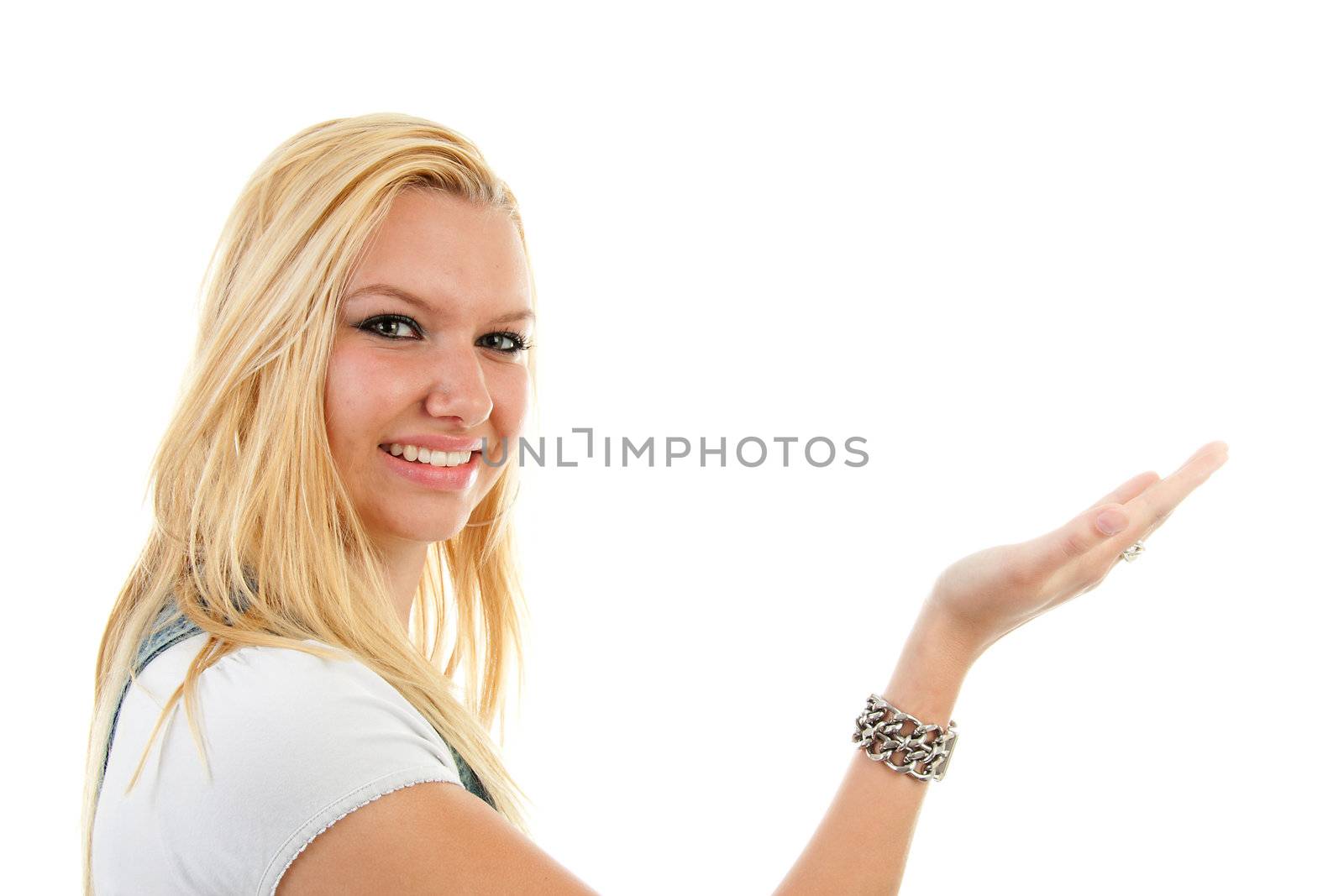 young blonde woman with open hand and ponting over white background