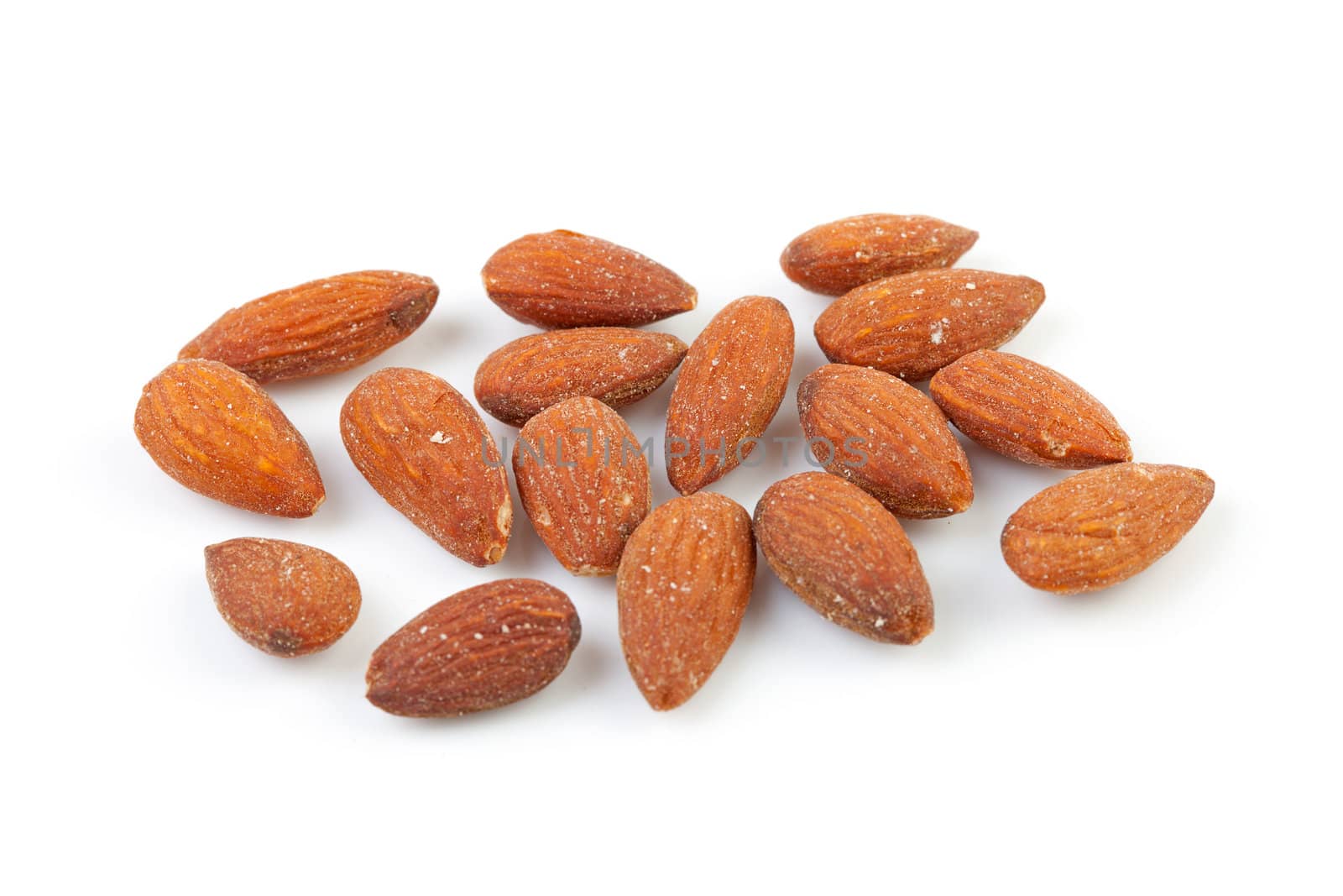 unpeeled almond nuts isolated on white background