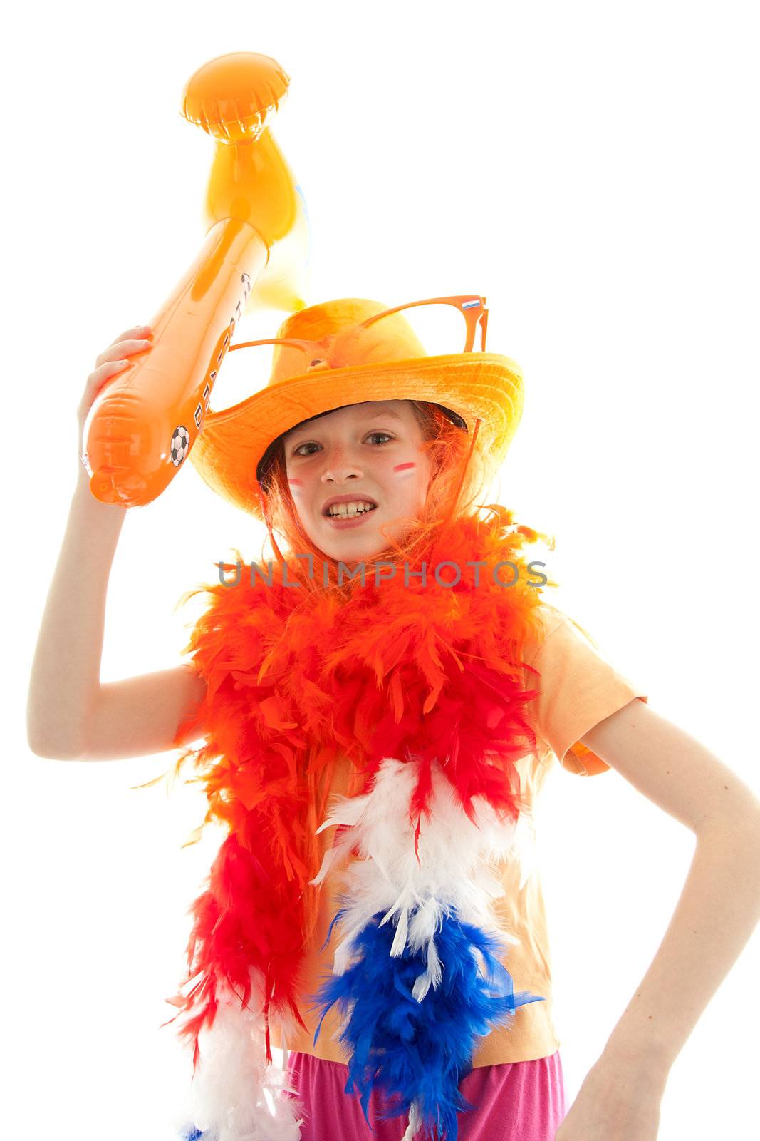 Young Dutch soccer supporter in orange outfit with big blown up hammer, over white background