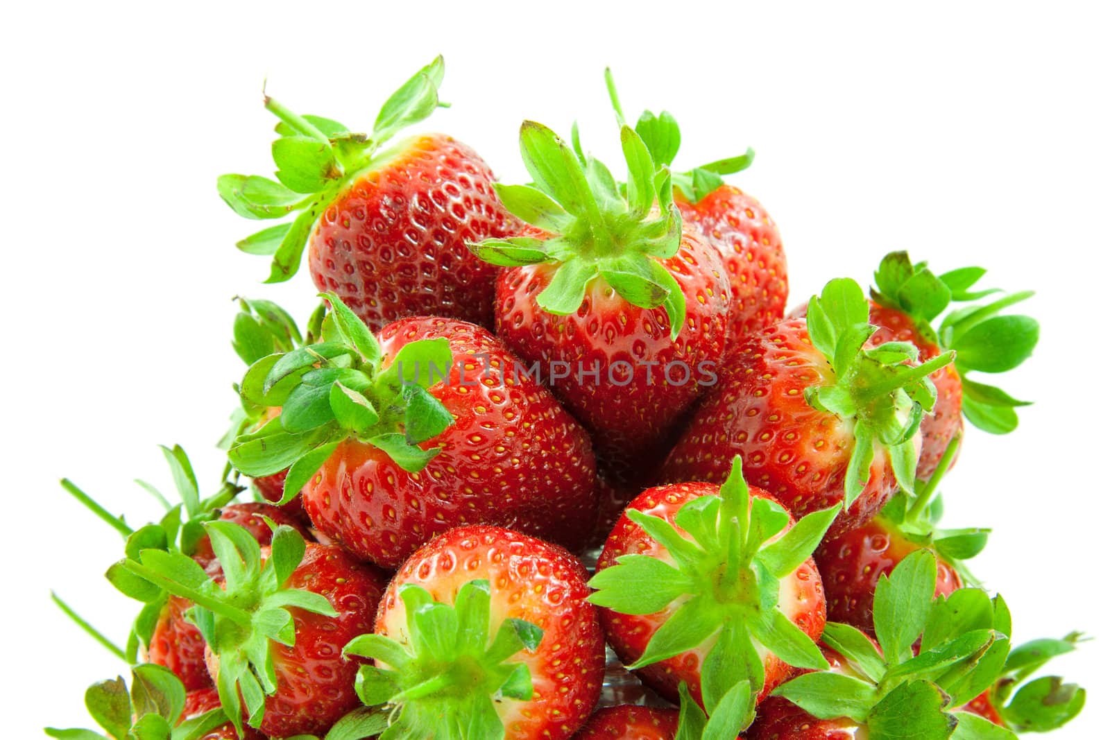 Lots of strawberry piled up over white background