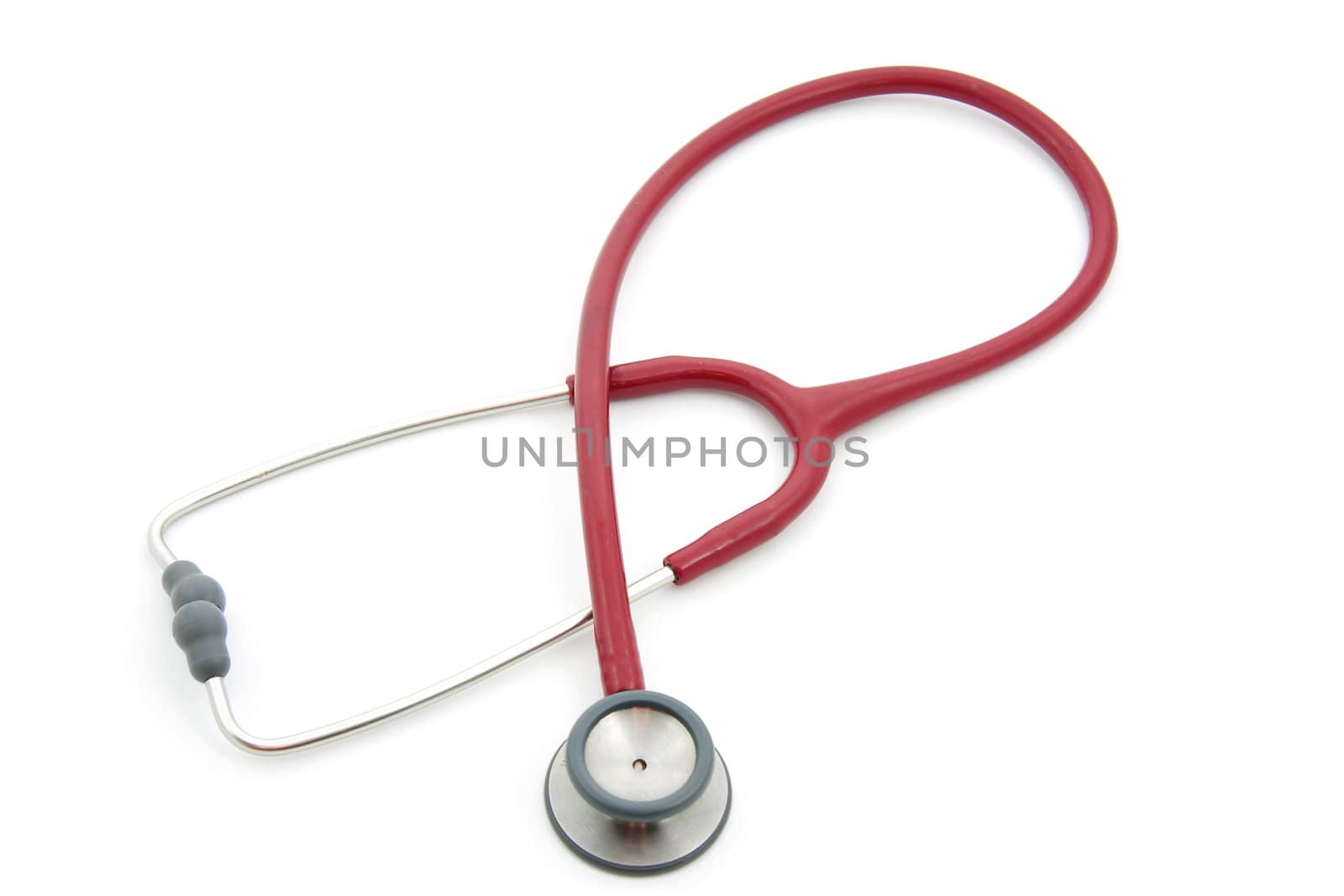 Red stethoscope isolated on white background