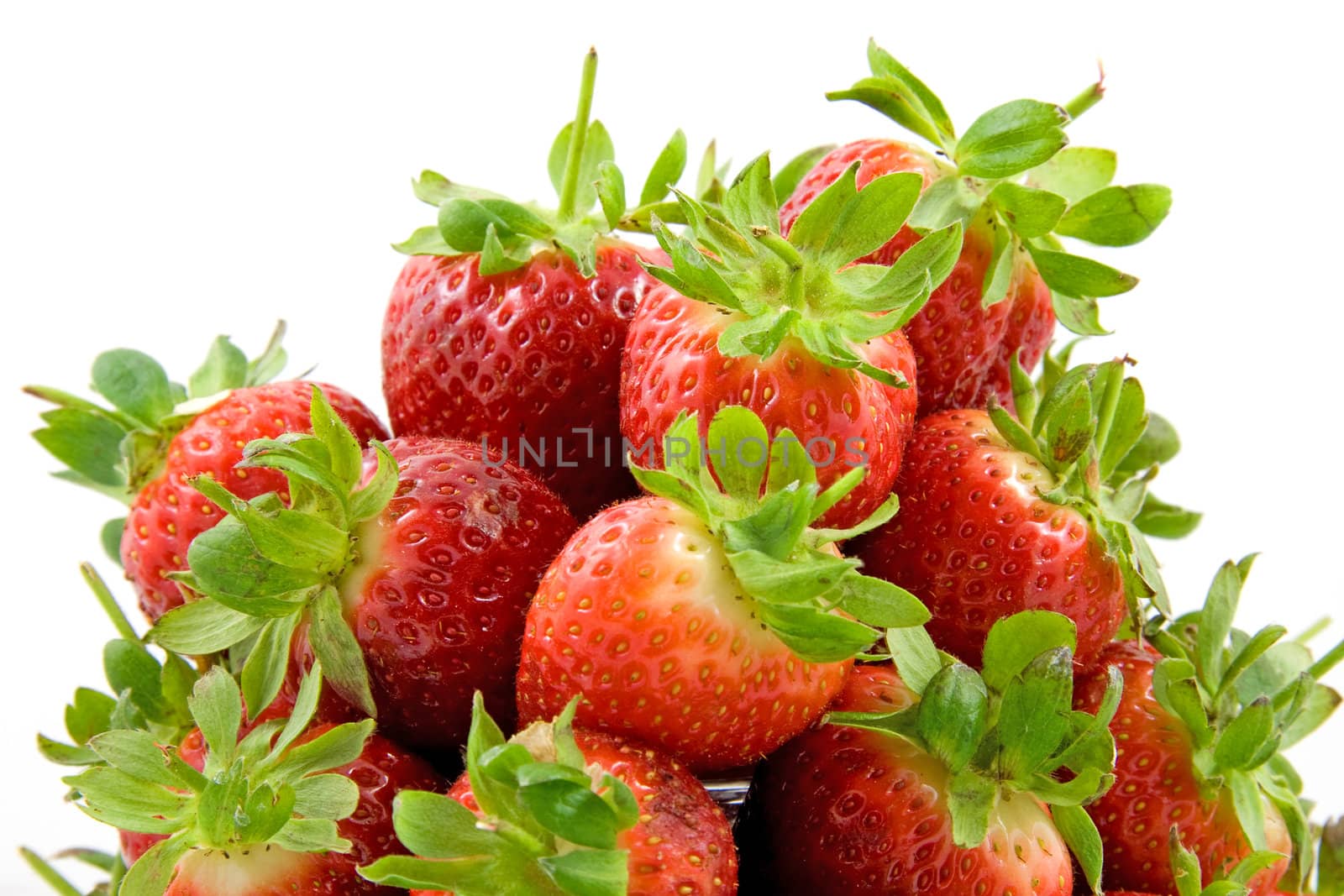 lots of strawberry piled up, isolated on white background