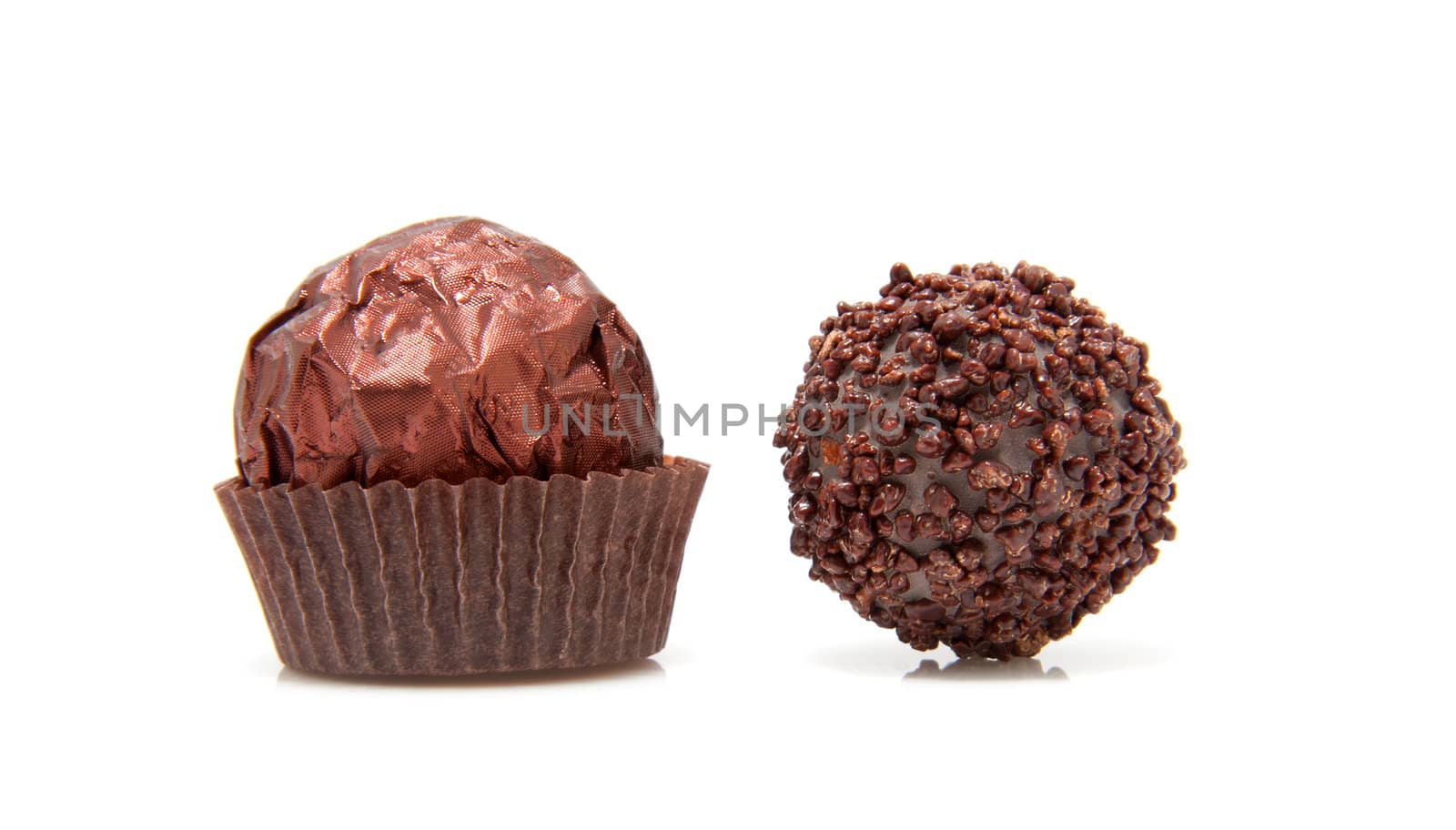 Two chocolate bonbons isolated on white background