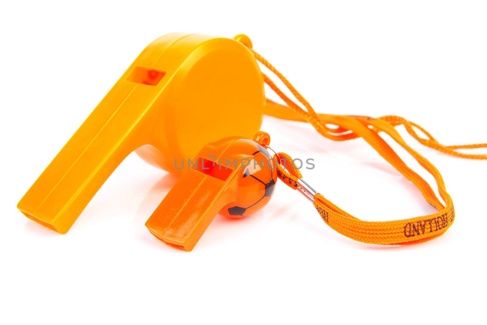 Two orange soccer flutes isolated on white background