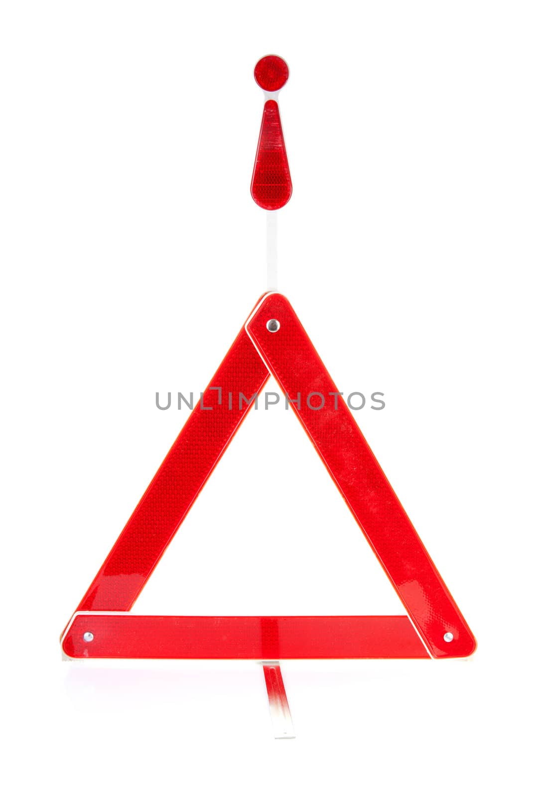 Foldaway reflective road hazard warning triangle isolated on a white background
