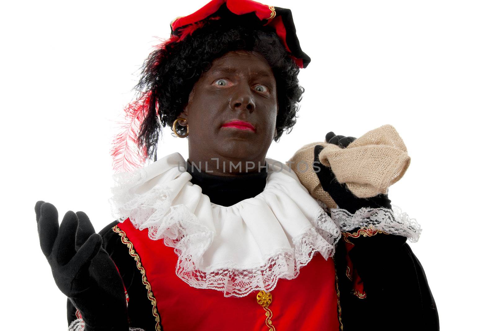 surprised Zwarte piet ( black pete) typical Dutch character part of a traditional event celebrating the birthday of  Sinterklaas in december over white background