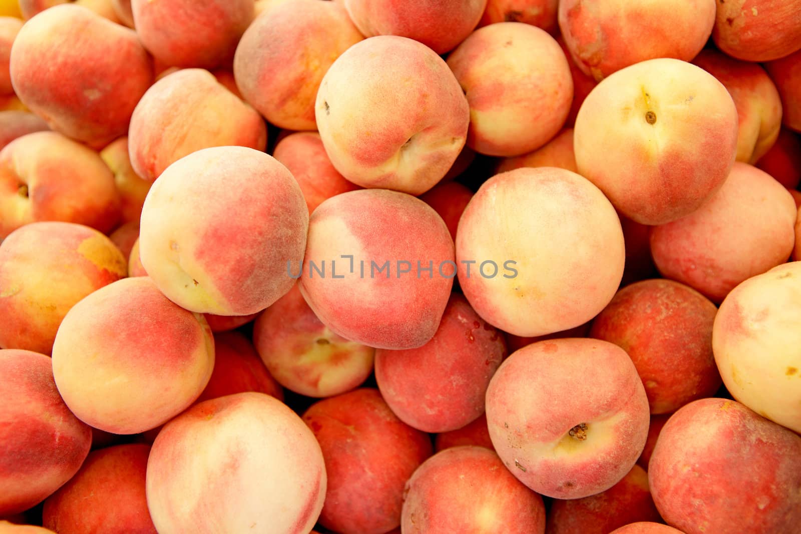 group of fresh peaches in closeup can be used as background