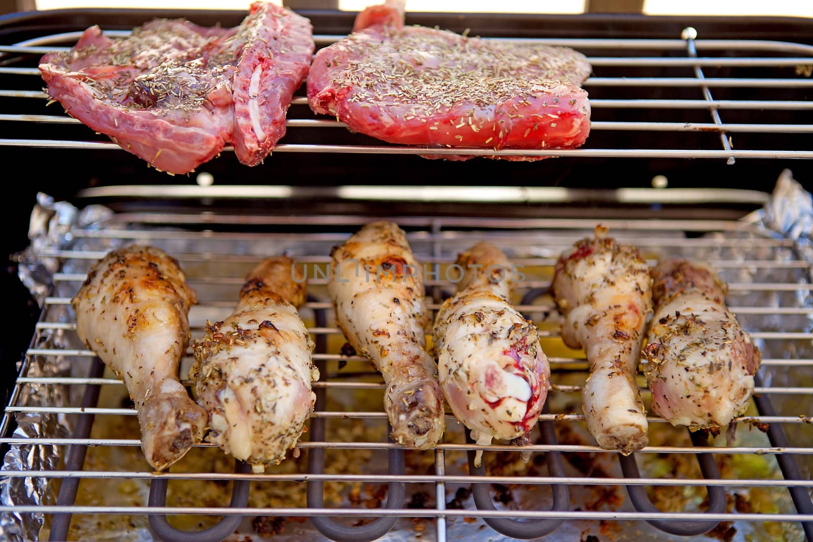 Meat and chicken on barbecue