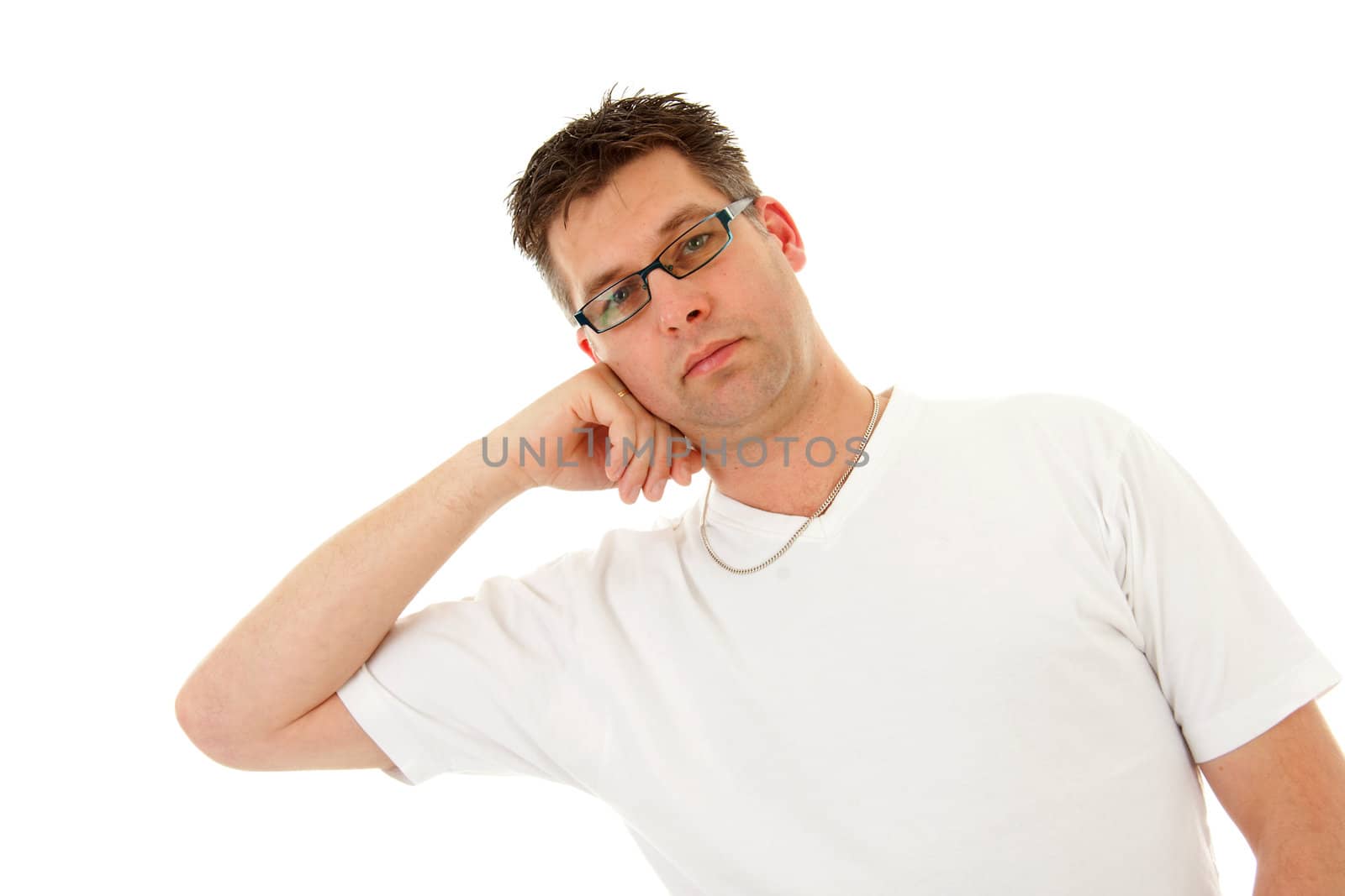 isolated man in white t-shirt is leaning and looking in camera