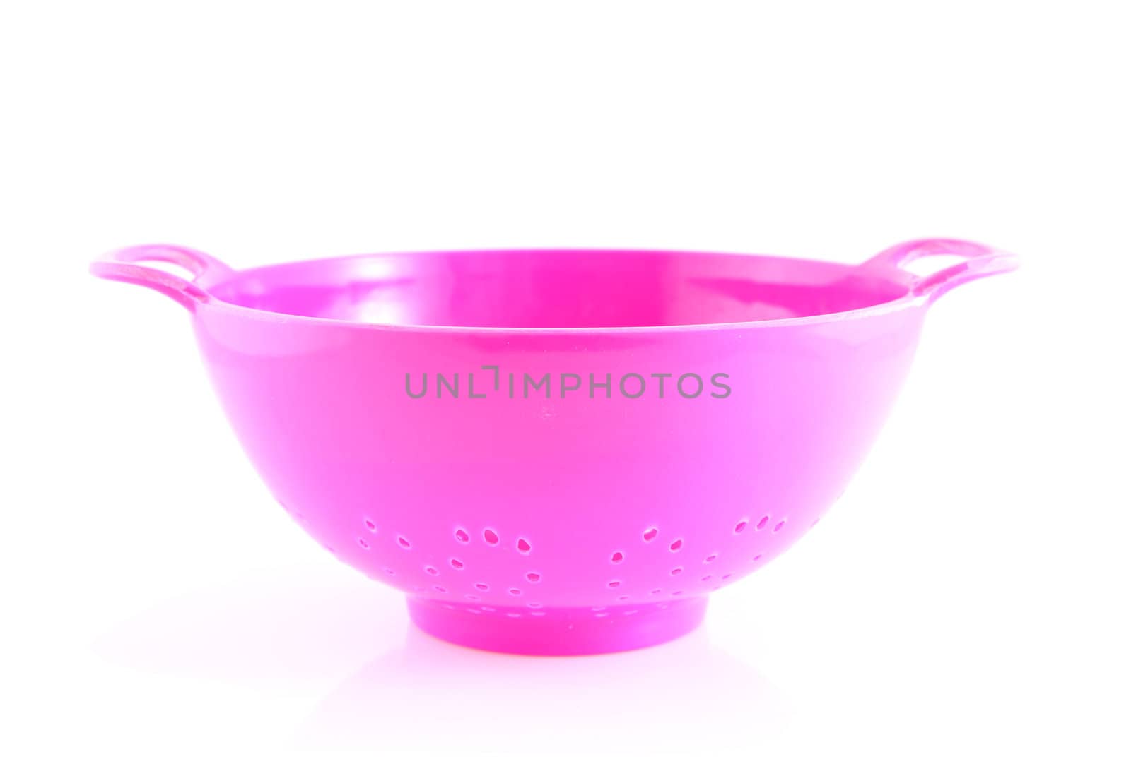 empty pink colander isolated on white background