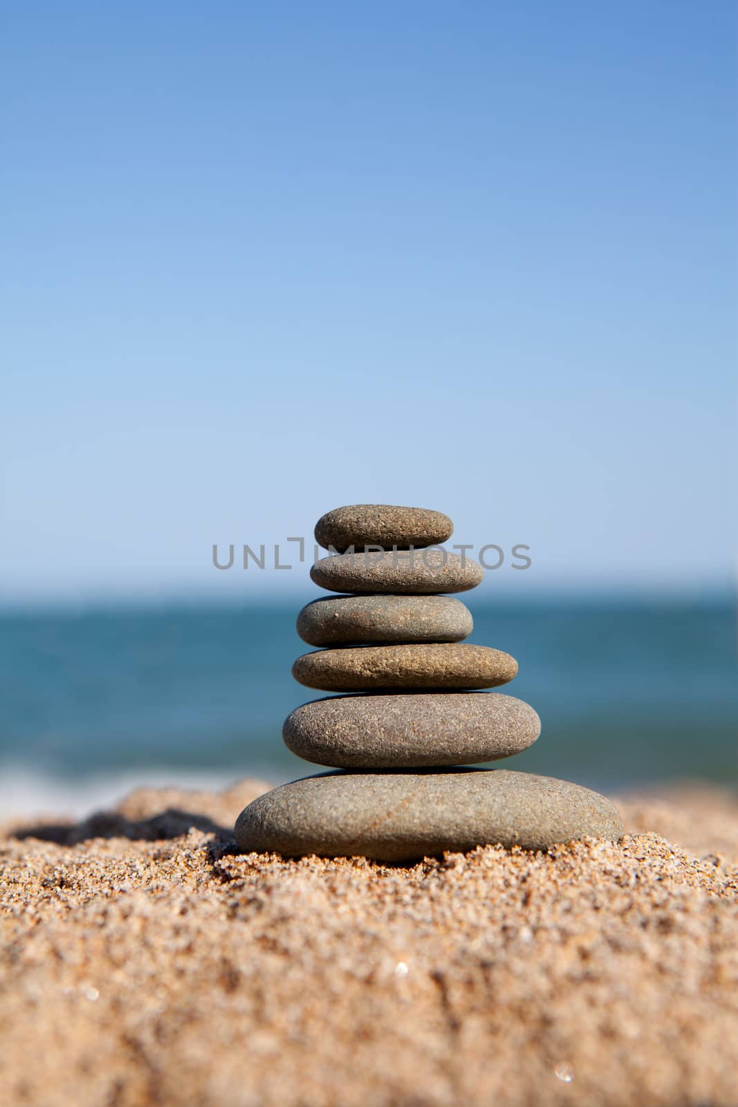 stack of stones near the ocean