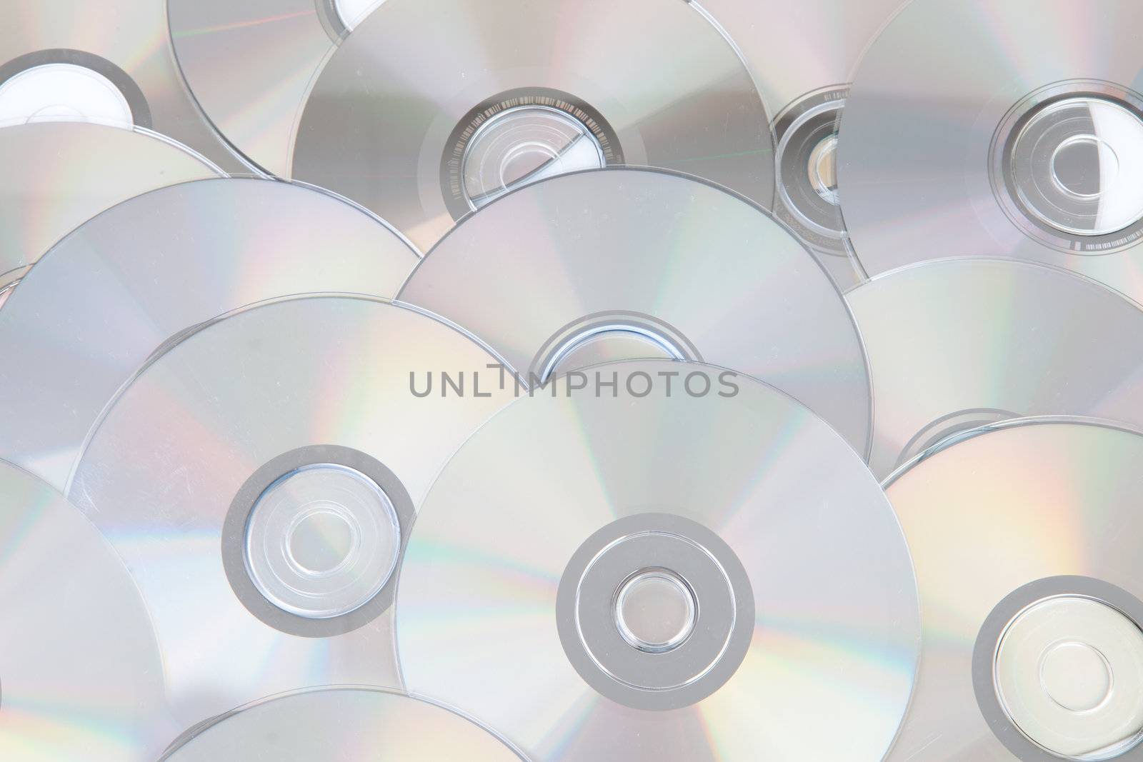 background made out of silver compact discs CDs in closeup
