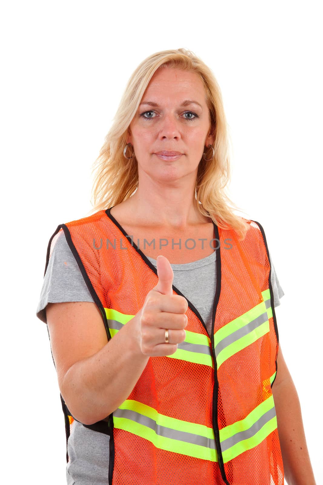 woman in safety vest with thumb up over white background
