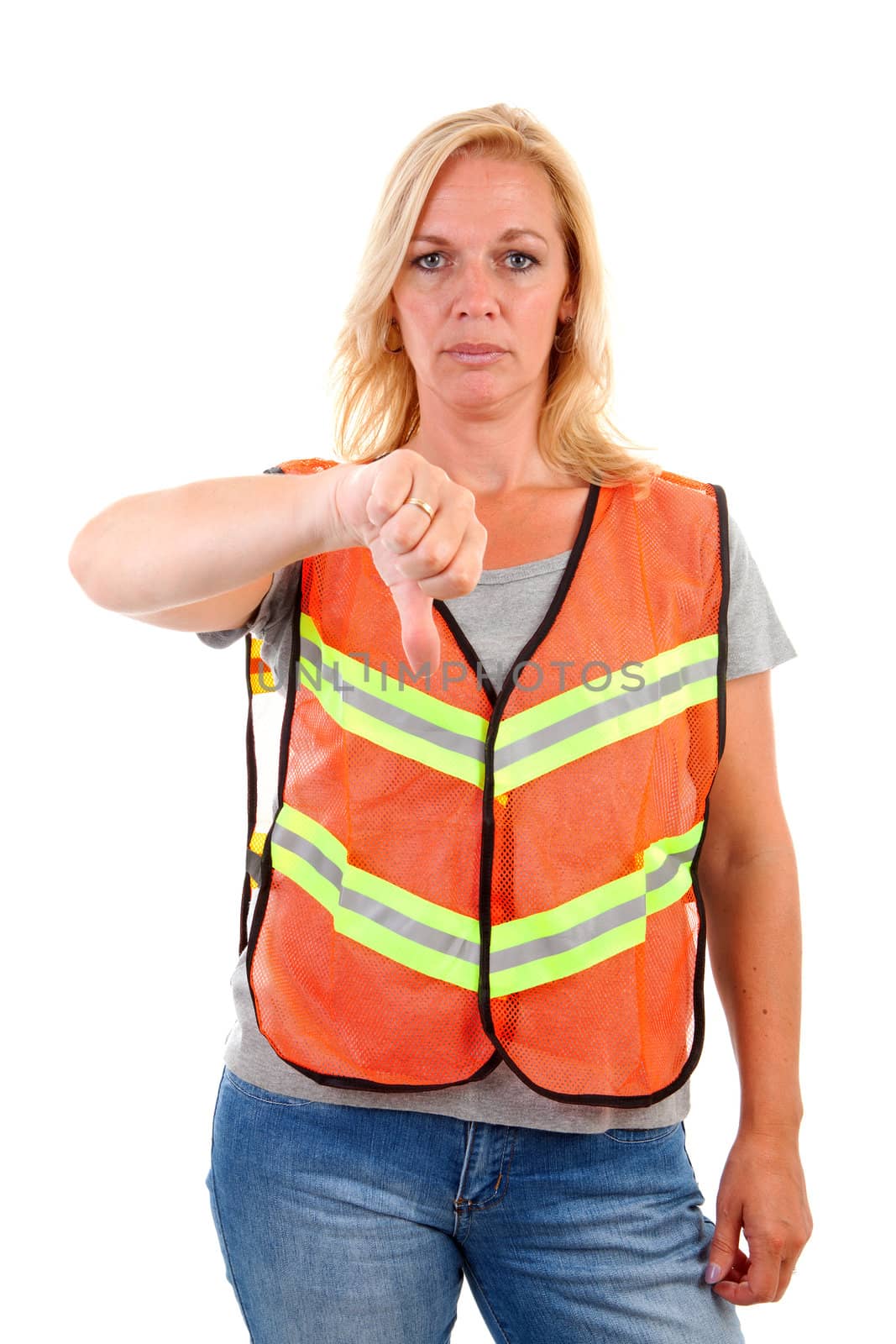 woman in safety vest with thumb down over white background