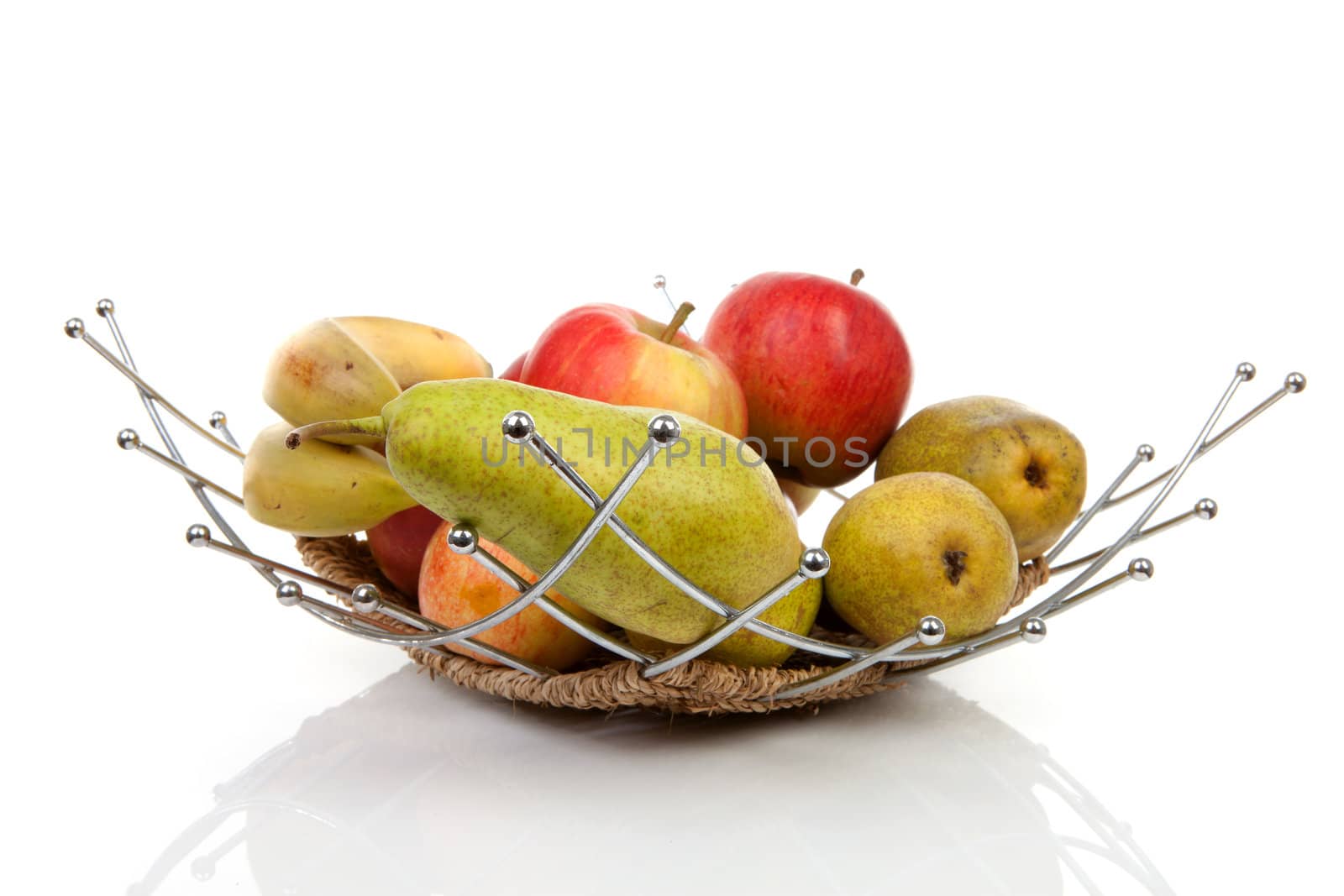 healthy fruit basket with apples, bananas and pears over white background