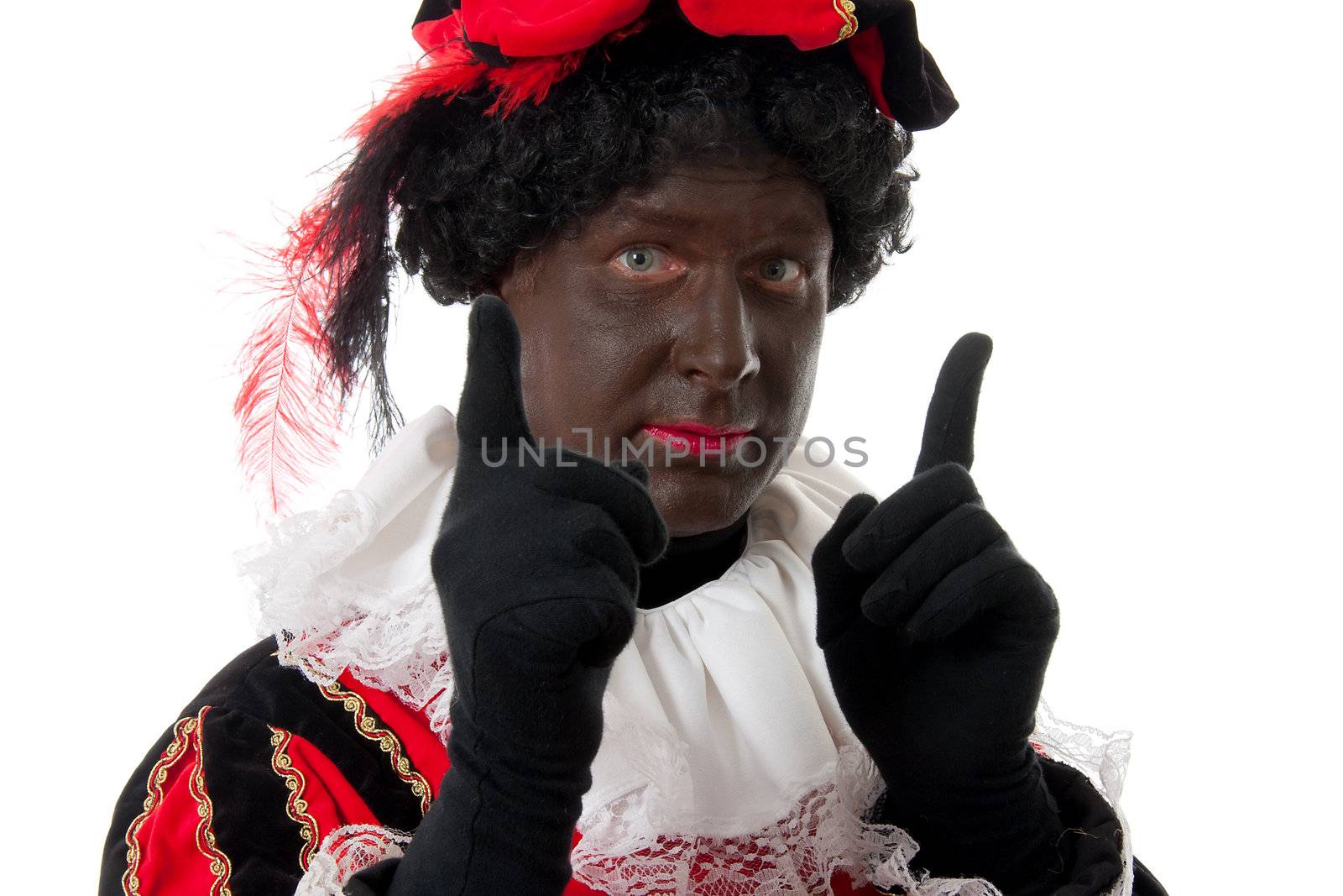 Zwarte piet ( black pete) typical Dutch character part of a traditional event celebrating the birthday of Sinterklaas in december over white background