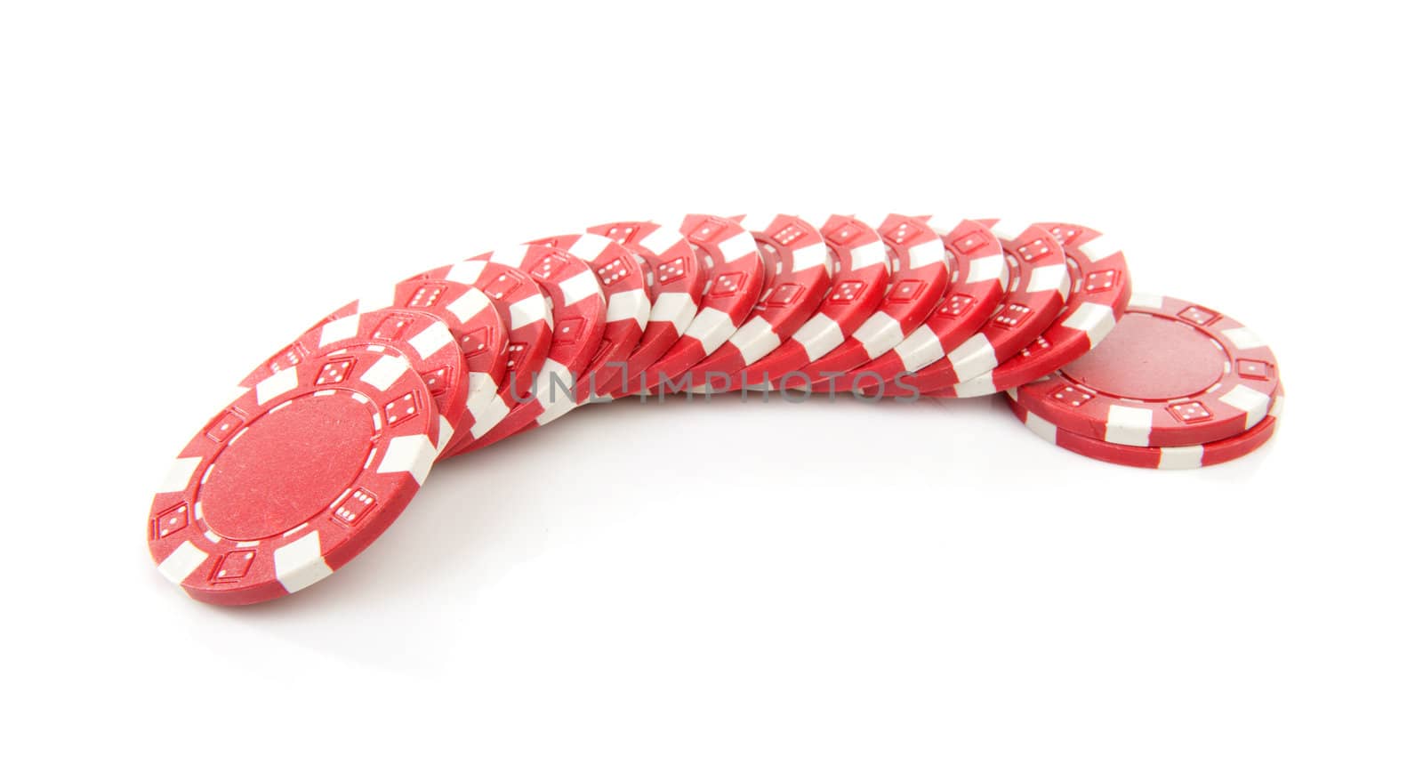 red poker casino chips isolated on white background